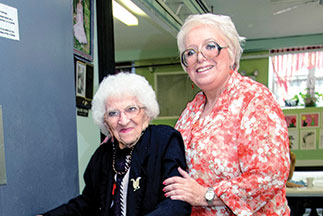 Two women smiling. Link to Life Stage Gift Planner Over Age 70 Situations.