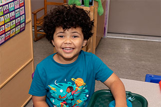 A boy smiling. Links to Gifts of Cash, Checks, and Credit Cards A boy smiling. Links to Gifts of Cash, Checks, and Credit Cards