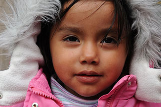 A little girl wearing a jacket. Links to Gifts That Protect Your Assets A little girl wearing a jacket. Links to Gifts That Protect Your Assets