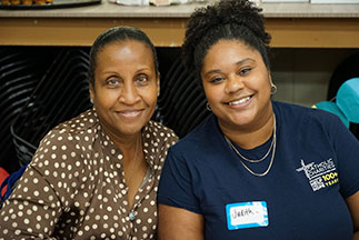 Two volunteers smiling. Links to Beneficiary Designations Two volunteers smiling. Links to Beneficiary Designations