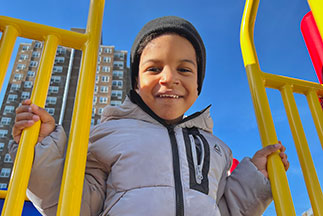 A boy on a playground. Links to Tangible Personal Property A boy on a playground. Links to Tangible Personal Property