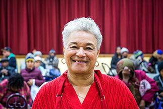A volunteer smiling. Link to Life Stage Gift Planner Ages 60-70 Situations.