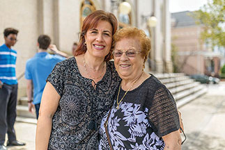 Two women smiling. Links to Beneficiary Designations Two women smiling. Links to Beneficiary Designations
