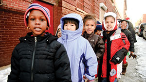 Photo of children wearing coats